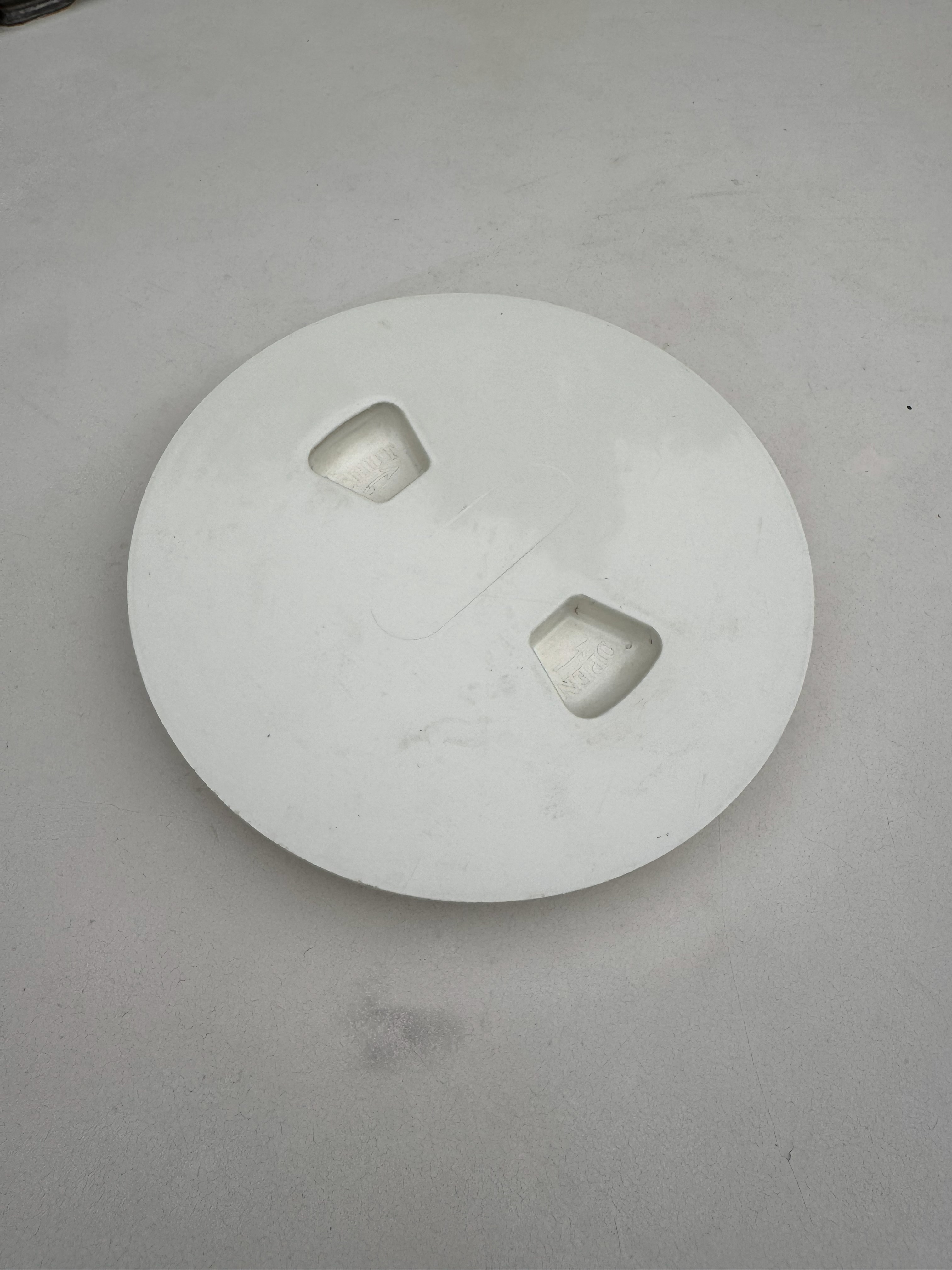 Installed view of Beckson or West Marine 4 inch inspection port