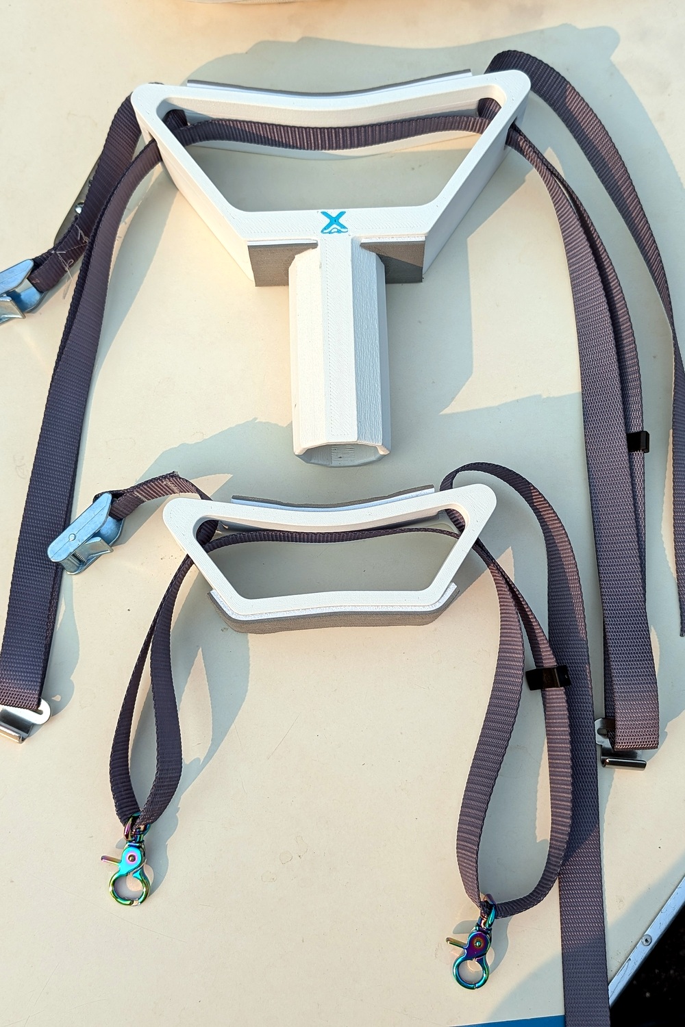 Complete MarinerX Spar Mount development kit with front mast-step mount, rear padded support, straps, buckles and hooks